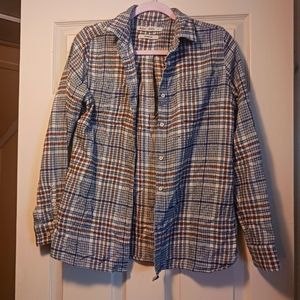 Woolrich blue and burnt orange plaid flannel. Size small.